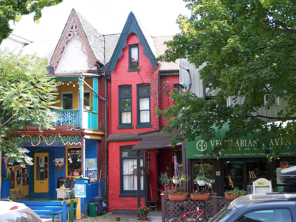 Row of painted timber houses on a street