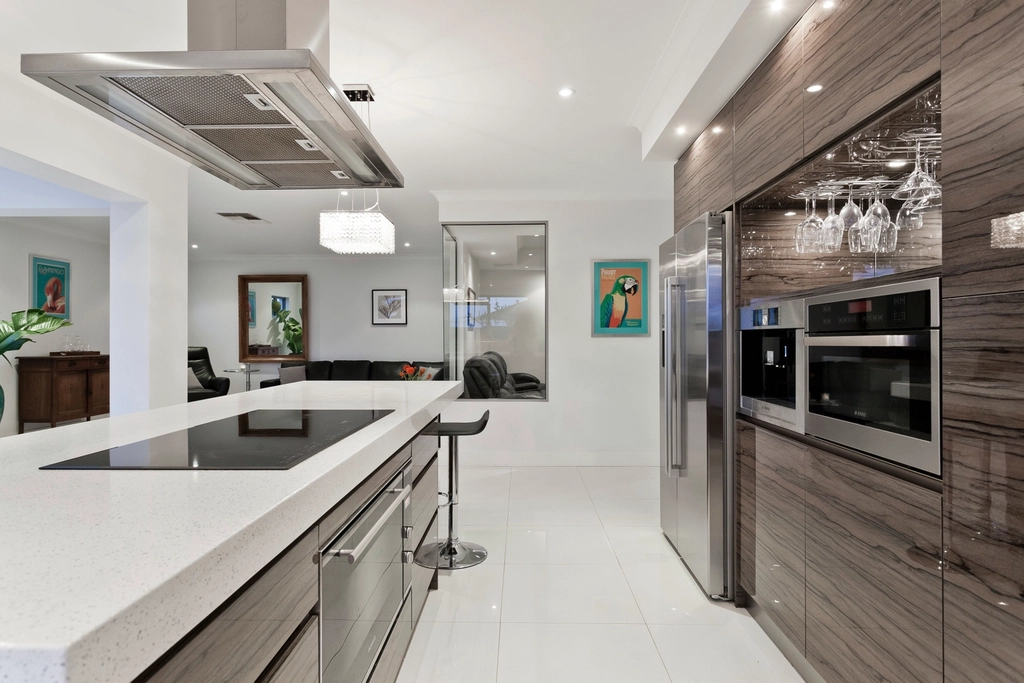 Modern kitchen with a central island and stainless steel appliances